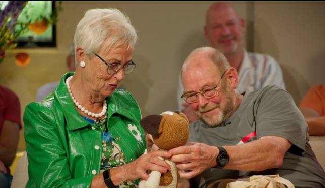 Magda en Gene bij de reunie.